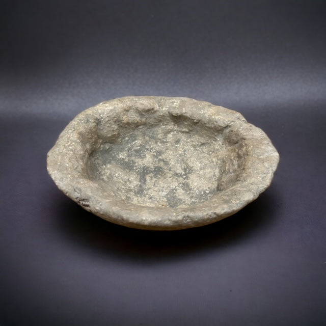 Small natural stone vintage bowl with green accents