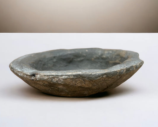 Small dark green limestone antique bowl